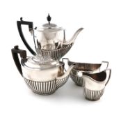 A matched four-piece late-Victorian silver tea and coffee set, by William Hutton and Sons, London