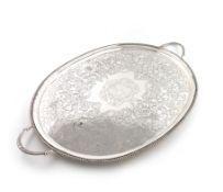 A George III silver two-handled tray, by William Bennett, London 1806, oblong form, gadroon border