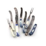 A small collection of 18th century porcelain handled knives and forks, pistol grip handles, some