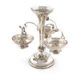 A silver épergne, by Walker and Hall, Sheffield 1915, with a central trumpet vase, with three scroll