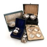 A mixed lot of five cased sets silver items, various dates and makers, comprising: a mug of baluster