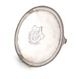 A George III silver salver, over-stamped with maker's mark of J*S, London 1777, circular form,