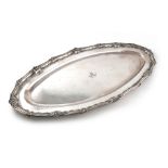 A French silver meat platter, circa 1900, elongated oval form, shell and scroll border and with