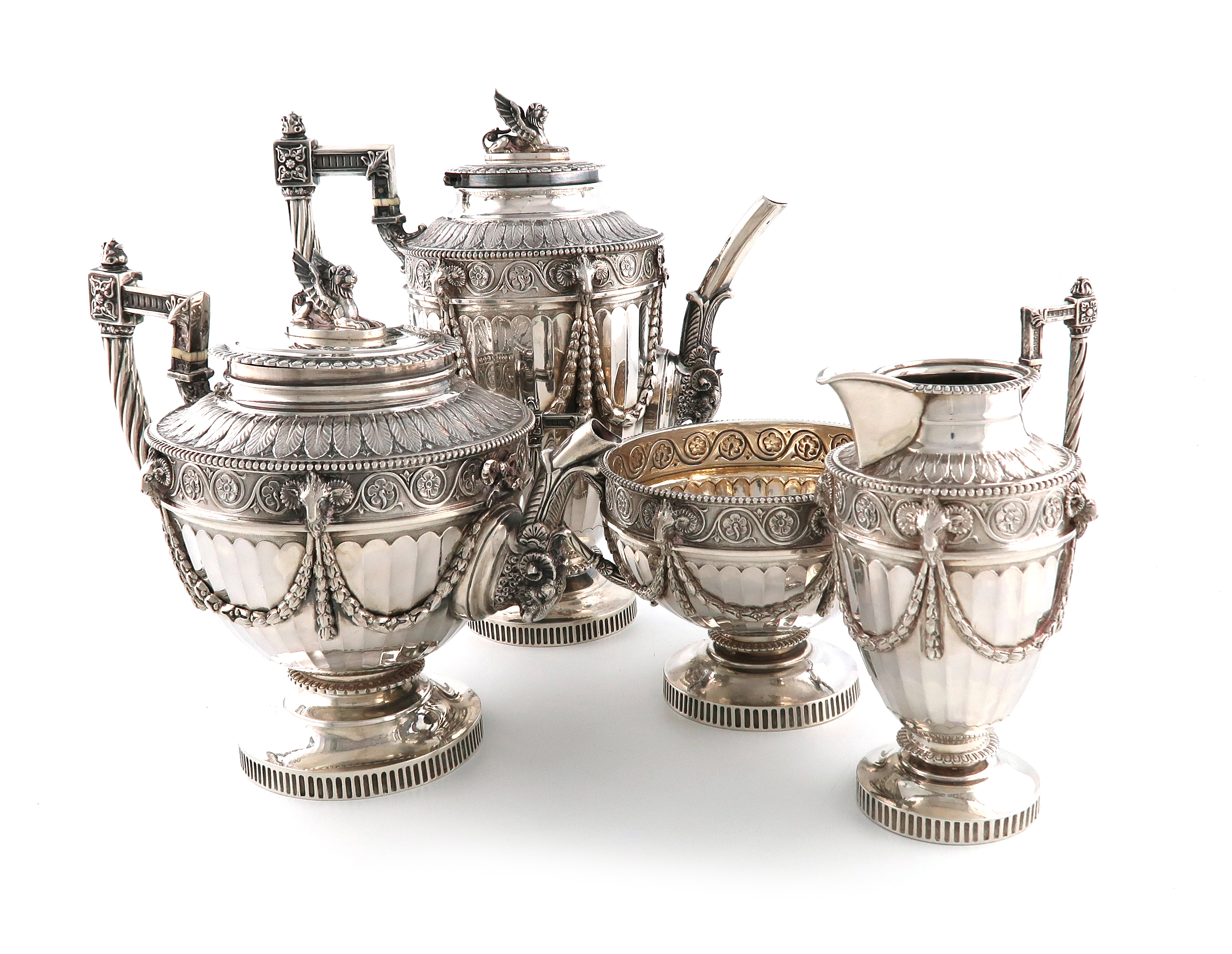 λA four-piece Victorian silver tea and coffee set, by John Mappin, London 1888, tapering fluted