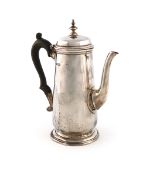 A silver coffee pot, by The Barnards, London 1910, tapering circular form, scroll handle, domed