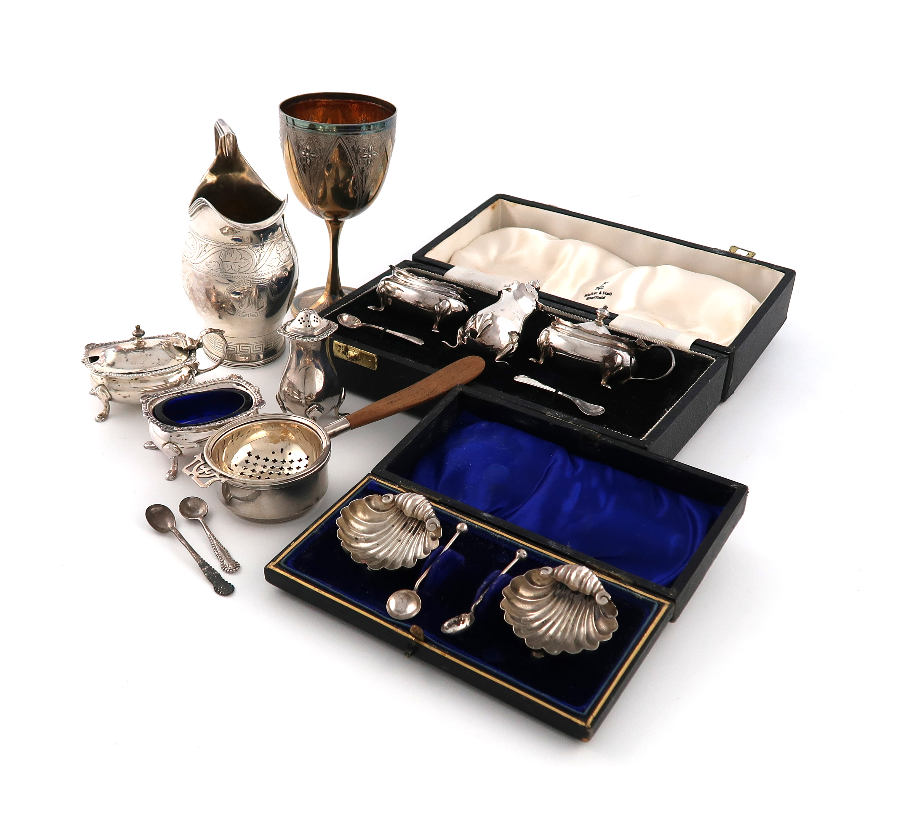 A mixed lot of silver items, various dates and makers, comprising: a George III cream jug, by