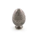 A 19th century continental silver spice box, unmarked circa 1820, egg form, engine-turned