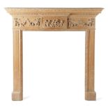 A CARVED PINE FIRE SURROUND / CHIMNEY PIECE IN GEORGE III STYLE LATE 19TH CENTURY with leaf carved