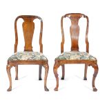 TWO GEORGE I WALNUT SIDE CHAIRS C.1720 each with a vase shape splat, above a later needlework drop-