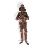 A BLACK FOREST LINDEN WOOD FIGURE OF A FARMER 19TH CENTURY the bearded figure standing and wearing a