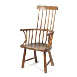 A FOLK ART PRIMITIVE ASH AND ELM CHILD'S WINDSOR ARMCHAIR PROBABLY WELSH, LATE 18TH / EARLY 19TH