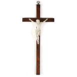 λ A CARVED IVORY CORPUS CHRISTI FRENCH OR ITALIAN, LATE 19TH CENTURY on a rosewood cross the figure: