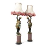 A PAIR OF ITALIAN GILT AND POLYCHROME DECORATED PINE BLACKAMOOR TORCHERES VENICE, LATE 19TH