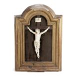 λ A FRENCH IVORY CORPUS CHRISTI LATE 18TH / EARLY 19TH CENTURY with a wooden cross mounted in an