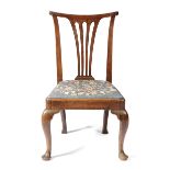 A GEORGE II MAHOGANY SIDE CHAIR C.1750 with a scrolled top rail above a pierced splat back and a