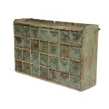 A BANK OF PAINTED PINE APOTHECARY DRAWERS 19TH CENTURY with twenty-eight drawers, with knob