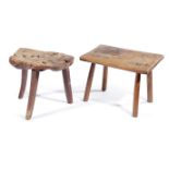 TWO PRIMITIVE COUNTRY STOOLS 19TH CENTURY one with the remains of painted decoration, the other with