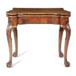 A GEORGE II WALNUT CONCERTINA ACTION CARD TABLE IN THE MANNER OF BENJAMIN CROOK, C.1735 the