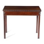 AN EARLY GEORGE III MAHOGANY CONCERTINA ACTION CARD TABLE C.1770 the hinged top with a ribbon and