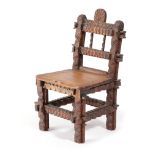 AN AMERICAN TRAMP ART PINE MINIATURE CHAIR LATE 19TH / EARLY 20TH CENTURY 33.4cm high, 20cm wide