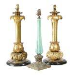 A PAIR OF WILLIAM IV GILT BRASS TABLE LAMPS C.1835 of lappet form, with a leaf scroll base and a