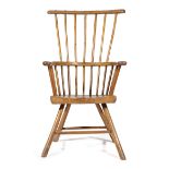 A FOLK ART PRIMITIVE ASH WINDSOR ARMCHAIR PROBABLY WELSH, 19TH CENTURY of small proportions, the