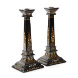 A PAIR OF VICTORIAN PAPIER-MACHE CANDLESTICKS BY JENNENS & BETTRIDGE, C.1860 decorated in gilt and