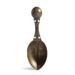 AN EARLY COPPER ALLOY / BRONZE SPOON POSSIBLY SOUTH GERMAN, 15TH CENTURY OR EARLIER double ended and