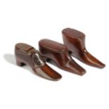 THREE TREEN MAHOGANY SNUFF SHOES 19TH CENTURY with brass tack decoration, one with a hinged lid