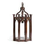 A SMALL MAHOGANY OCTAGONAL HALL LANTERN PROBABLY EARLY 20TH CENTURY decorated with turned columns