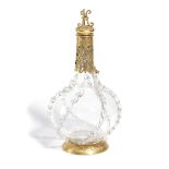 A FRENCH GILT METAL MOUNTED GLASS DECANTER AND STOPPER IN RENAISSANCE STYLE, LATE 19TH CENTURY