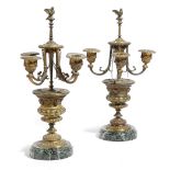 A PAIR OF FRENCH GILT BRONZE CANDELABRA LATE 19TH CENTURY each decorated with urns and cherub