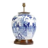 A CHINESE BLUE AND WHITE PORCELAIN VASE TABLE LAMP with later wooden mounts 40cm high