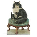 A PAINTED DUMMY BOARD MID-20TH CENTURY depicting a cat and a kitten on a stool, with an easel back