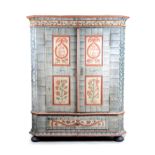 A FOLK ART PAINTED PINE MARRIAGE ARMOIRE POSSIBLY TYROLEAN painted with scrolling leaves and