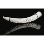 λ A CARVED IVORY TUSK HUNTING HORN 19TH CENTURY all over carved with a wild boar hunt with hound