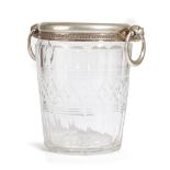 A CUT-GLASS ICE BUCKET LATE 19TH / EARLY 20TH CENTURY with a silver plated rim, with a pair of swing