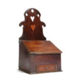 A FOLK ART MAHOGANY HANGING WALL BOX EARLY 19TH CENTURY the fret back decorated with love hearts,