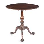 A GEORGE II MAHOGANY TRIPOD TABLE C.1740 AND LATER the circular dished tilt-top on a ring turned