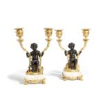 A PAIR OF LOUIS XVI GILT AND PATINATED BRONZE FIGURAL CANDELABRA LATE 18TH CENTURY each modelled