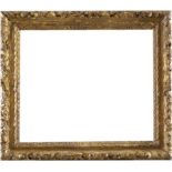 A 18th Century carved giltwood frame With foliate decoration 66.4 x 78.2cm; 26¼ x 30¾in rebate