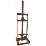 An Early 20th Century Madderton & Costained pine folding easel 227cm; 89¼in high (extended)