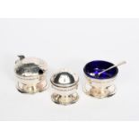 A Liberty & Co silver cruet set, model no.491, comprising footed salt with blue glass liner,