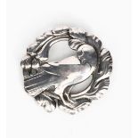 A Georg Jensen silver brooch, model no.70, the dove designed by Christian Mohl-Hansen, circular,