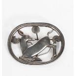 A Georg Jensen silver brooch designed by Arno Malinowski, model no.256, pierced and cast in low