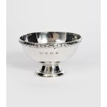 A Duchess of Sutherland's Cripples Guild silver footed bowl, tapering cylindrical foot supporting