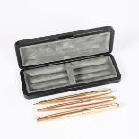 A Parker rolled gold 61 fountain pen pencil and ball pen set, stamped marks, 13cm. long, (3)