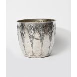 An Art Nouveau Dutch KMD Tiel pewter planter, flaring cylindrical form, cast in low relief with