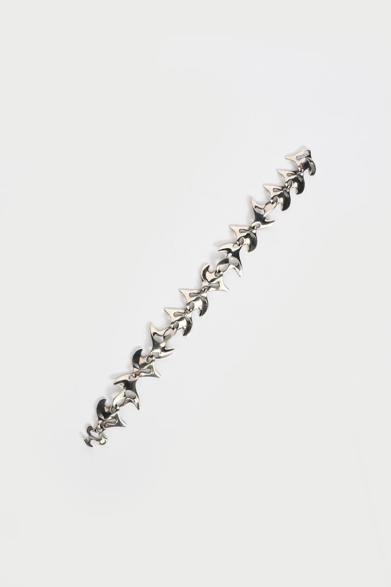 A Georg Jensen silver link necklace designed by Henning Koppel, model no.68, thirteen linked panels,