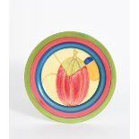 'Pastel Melon' a Clarice Cliff Fantasque Bizarre plate, painted in colours inside blue, pink and